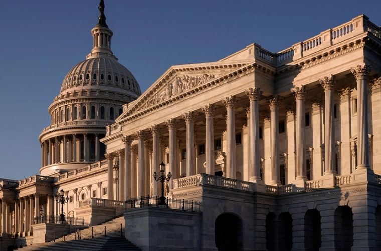 Huge spending bill passes 50-49